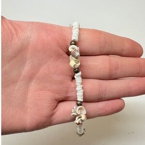 White Heishi Bead and Natural Puka Shell Adjustable Bracelet Bronze Tone